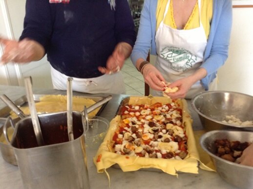 Pizza making in Sorrento - Chef Biaggio explaining how to put together a lasagne