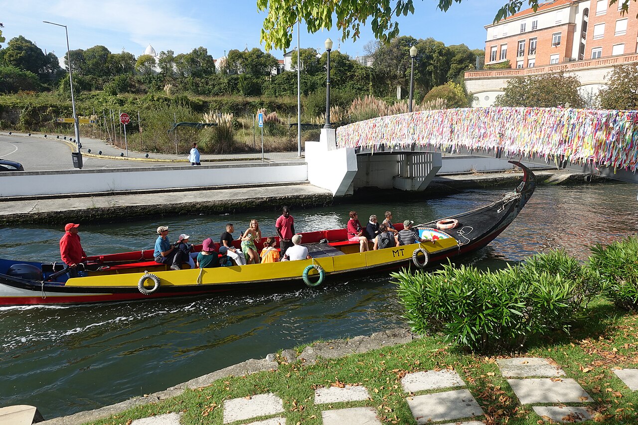 A painted moliceiro boat on a canal in Aveiro