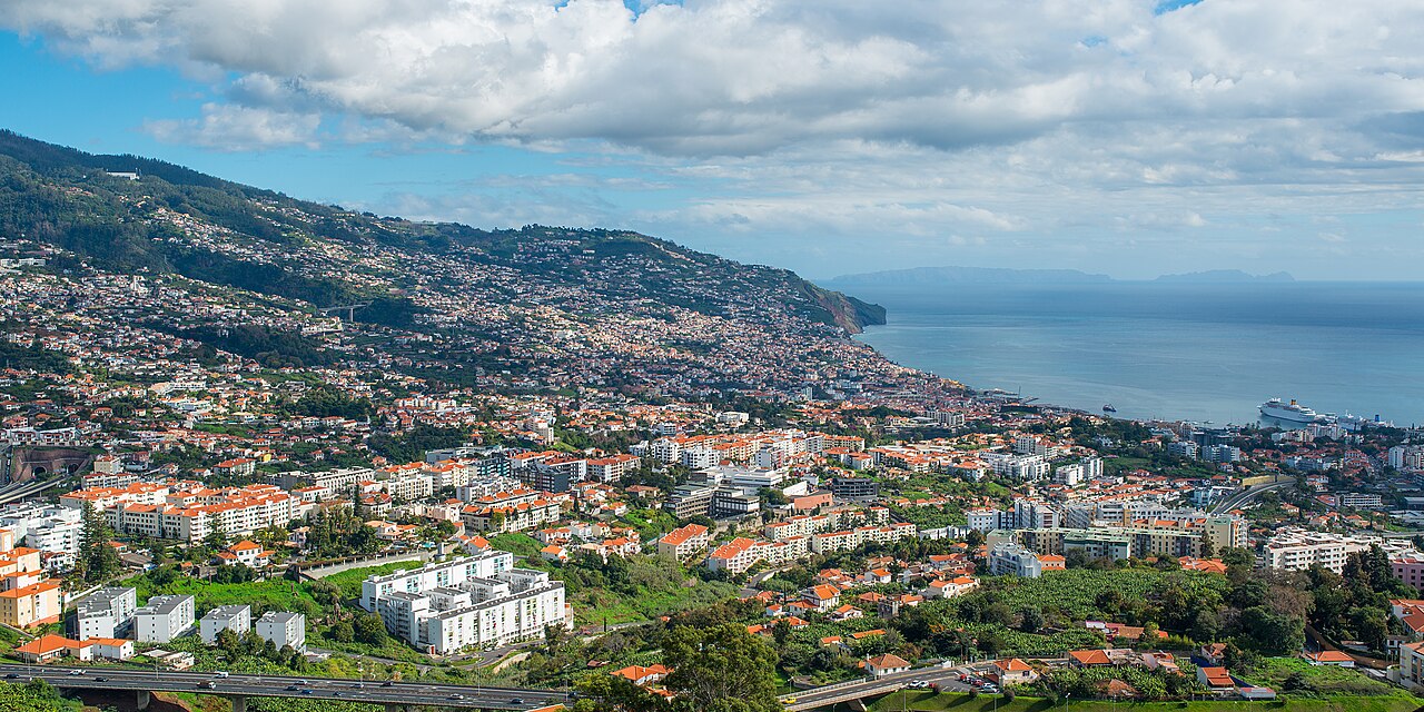Funchal spreading from the harbour up Madeira's green slopes