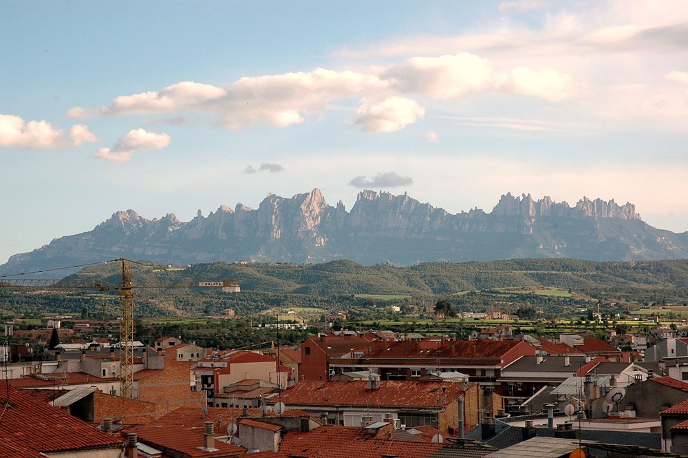 Montserrat's serrated mountain profile seen from Manresa in Catalonia